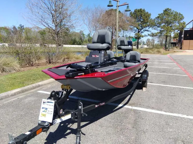 Slide: The Image of 2025 Tracker Bass Tracker Classic XL boat on trailer in parking lot. - 6