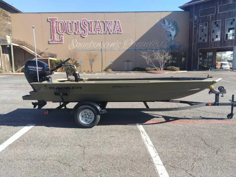 Slide: The Image of 2025 Tracker Grizzly 1654 T Sportsman boat on trailer, parked in Louisiana. - 4