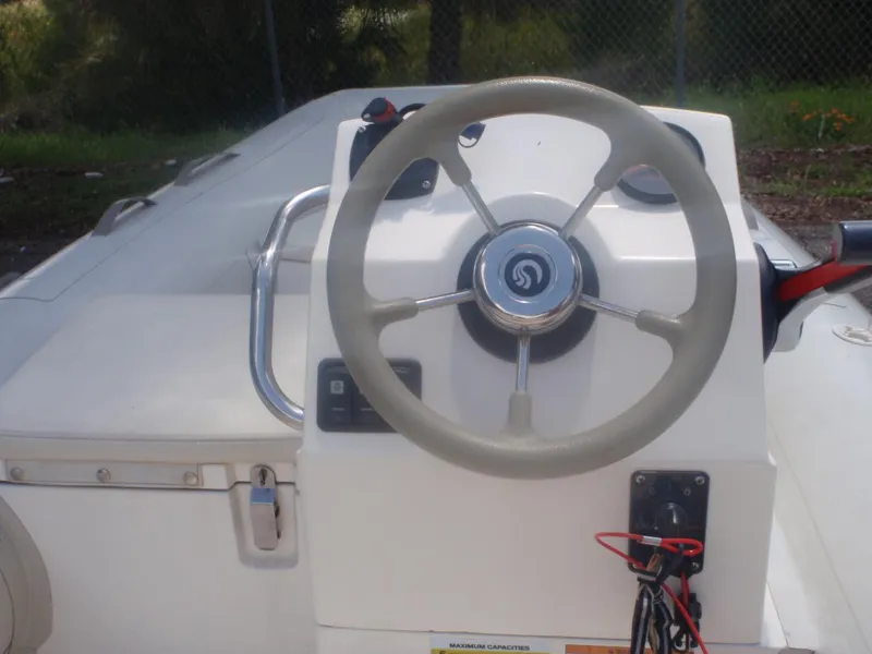 Slide: The Image of Steering console of 2016 Capelli Tempest 340 LE Tender boat. - 3