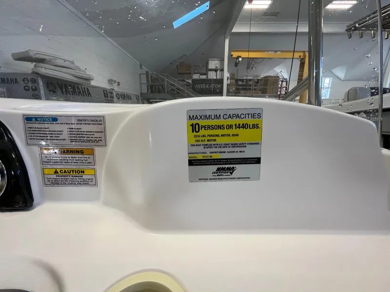 Slide: The Image of Boat capacity label on 2005 Godfrey FD211, maximum 10 persons or 1440 lbs. - 16