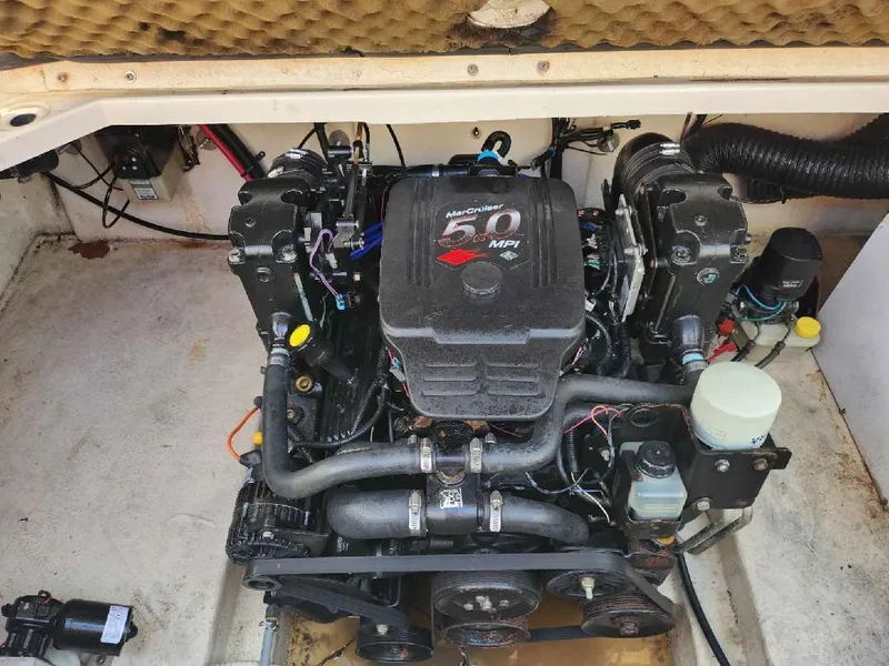 Slide: The Image of Engine compartment of a 2001 Sea Ray 240 Sundancer boat. - 17