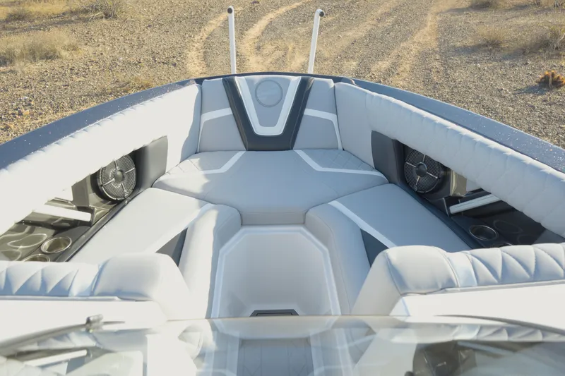 Slide: The Image of 2020 Tigé 25ZX boat interior with plush seating and modern design. - 4