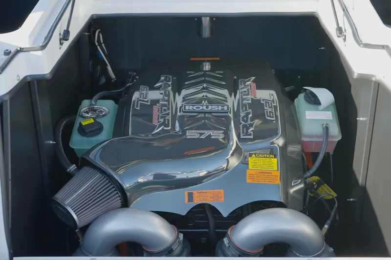 Slide: The Image of 2020 Tigé 25ZX boat engine, featuring a powerful Roush 575 motor. - 7