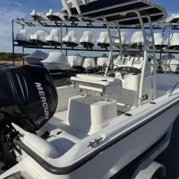 Slide: The Image of 2007 Boston Whaler 190 Outrage boat with Mercury engine, docked in marina. - 4