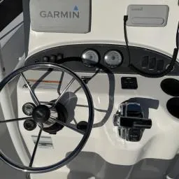 Slide: The Image of Steering console of a 2007 Boston Whaler 190 Outrage with Garmin navigation system. - 7