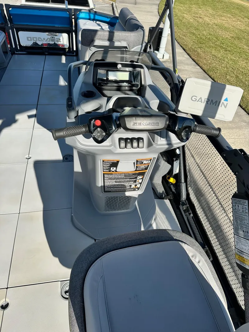 Slide: The Image of 2023 Sea-Doo Switch Cruise 21 dashboard with Garmin navigation system. - 4