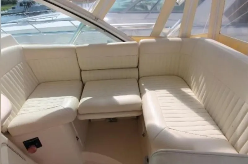 Slide: The Image of 2007 Grady-White Express 360 boat interior with cream leather seating. - 6