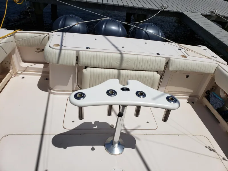 Slide: The Image of 2007 Grady-White Express 360 boat deck with rod holders and seating. - 7