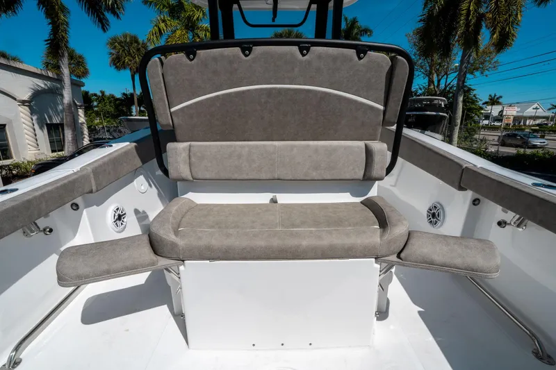 Slide: The Image of 2025 Sea Hunt Ultra 265 SE boat interior with cushioned seating and modern design. - 16