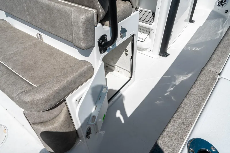 Slide: The Image of Interior seating and storage of 2025 Sea Hunt Ultra 265 SE boat. - 18
