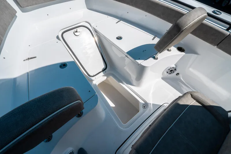 Slide: The Image of Interior view of 2025 Sea Hunt Ultra 265 SE boat with seating and storage. - 39