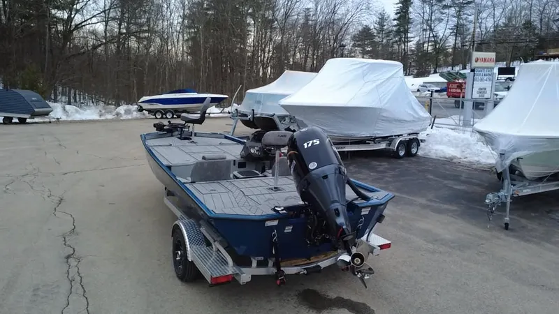 Slide: The Image of Avid 20 Vertex 2025 boat on trailer in snowy outdoor setting. - 3
