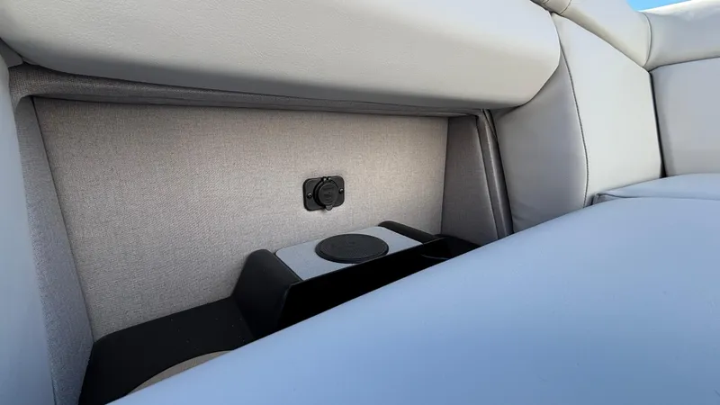 Slide: The Image of Interior of 2025 Balise HORIZON 24C boat with open storage compartment. - 26