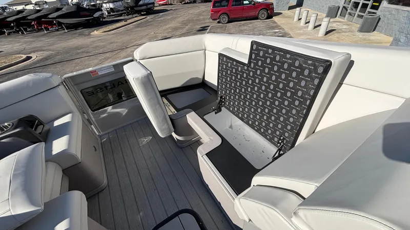 Slide: The Image of Luxurious interior of 2025 Balise HORIZON 24C boat with plush seating and cup holders. - 27