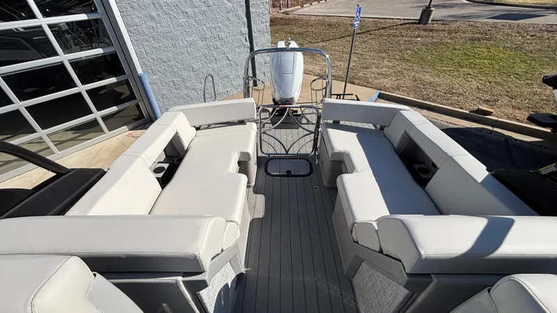 Slide: The Image of Interior view of 2025 Balise HORIZON 24C boat with seating and control panel. - 7