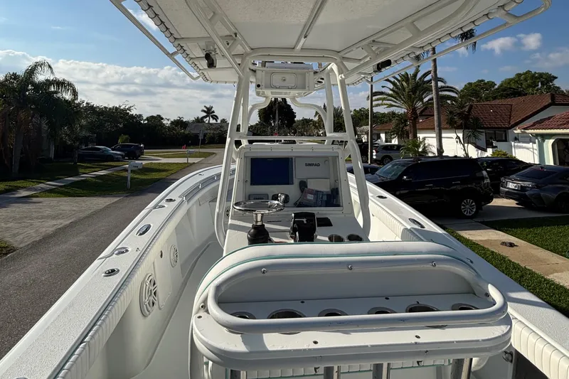 Slide: The Image of 2012 Yellowfin 29 boat with center console and modern navigation equipment. - 15