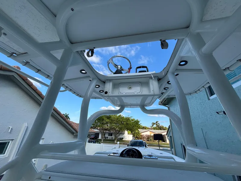 Slide: The Image of 2012 Yellowfin 29 boat interior view with clear sky background. - 8