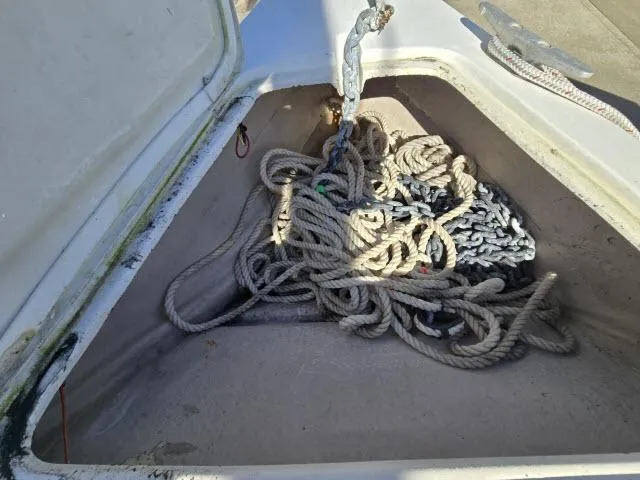 Slide: The Image of Anchor locker of 1983 Catalina 30 sailboat with coiled rope. - 16