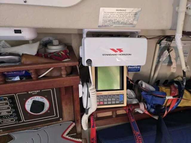 Slide: The Image of Standard Horizon marine radio on 1983 Catalina 30 sailboat, with navigation equipment and storage. - 7