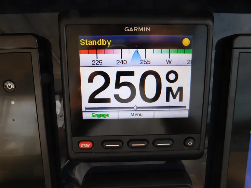 Slide: The Image of Garmin marine display showing 250M on a 2018 Pursuit OS 325 Offshore boat. - 14