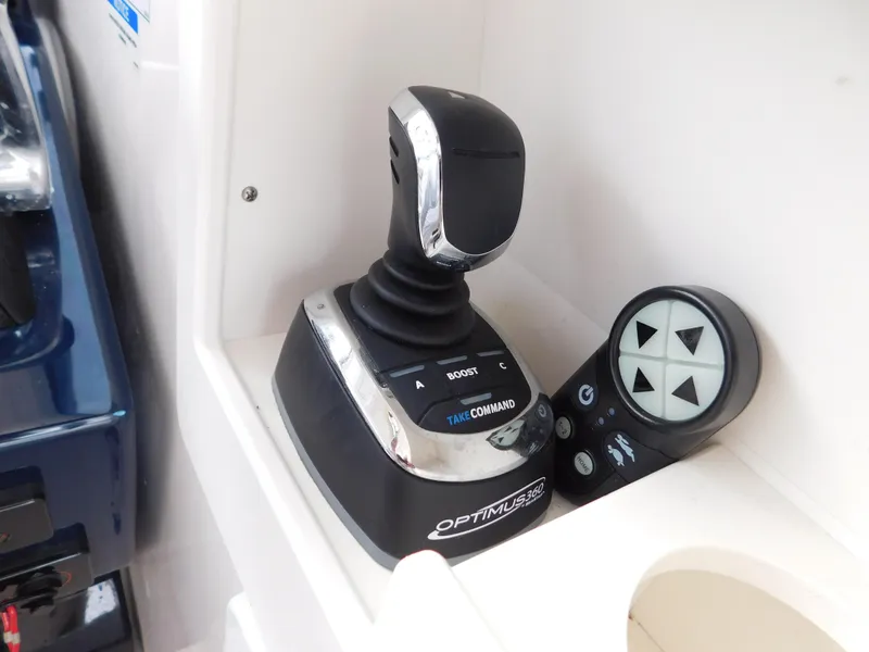 Slide: The Image of Joystick control system on 2018 Pursuit OS 325 Offshore boat. - 23