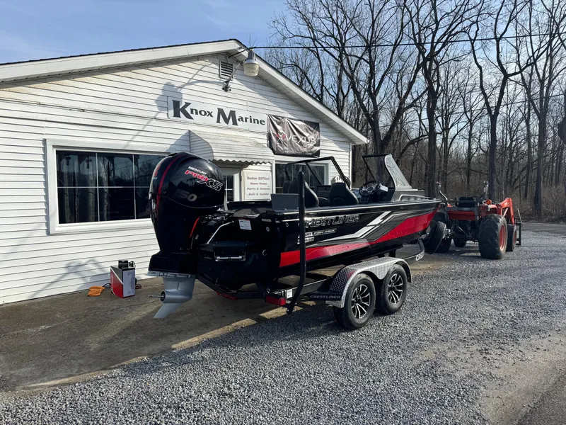 Slide: The Image of 2025 Crestliner 1850 Fish Hawk WT JS boat outside Knox Marine dealership. - 3