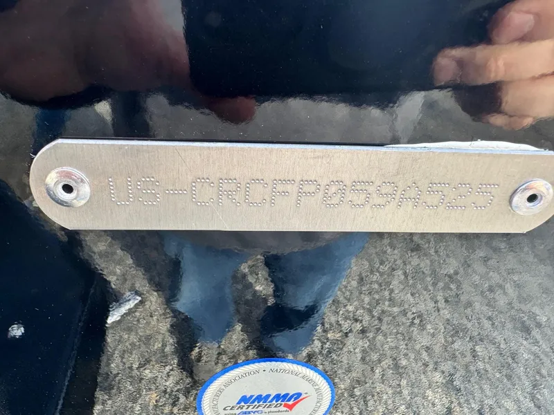 Slide: The Image of 2025 Crestliner 1850 Fish Hawk WT JS boat identification plate with NMMA certification. - 4