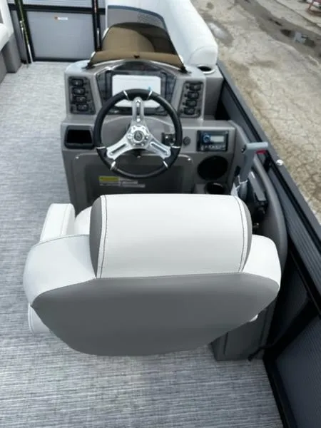 Slide: The Image of 2024 Qwest E824 RLS LTZ pontoon boat with spacious seating and modern design. - 3