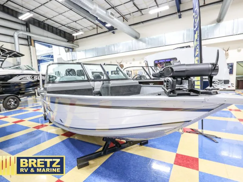 Slide: The Image of 2024 PRO ANGLER 162 boat displayed at Bretz RV & Marine showroom. - 1