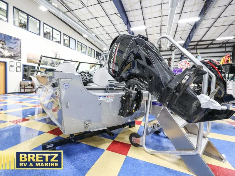 Slide: The Image of 2024 PRO ANGLER 162 boat with Mercury engine displayed at Bretz RV & Marine showroom. - 17
