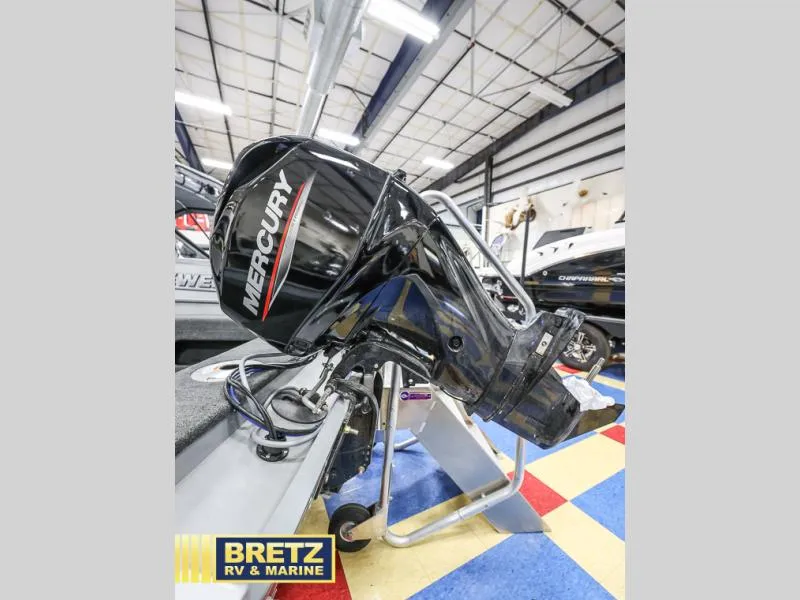 Slide: The Image of 2024 PRO ANGLER 162 with Mercury outboard motor at Bretz RV & Marine showroom. - 18