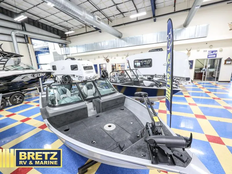 Slide: The Image of 2024 PRO ANGLER 162 boat displayed at Bretz RV & Marine showroom. - 3