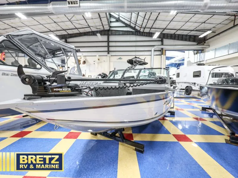 Slide: The Image of 2024 PRO ANGLER 162 boat displayed at Bretz RV & Marine showroom. - 6