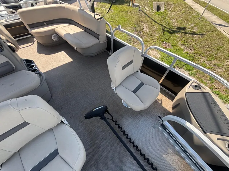 Slide: The Image of Interior of 2020 Sun Tracker Bass Buggy 18 DLX pontoon boat with seating and controls. - 22