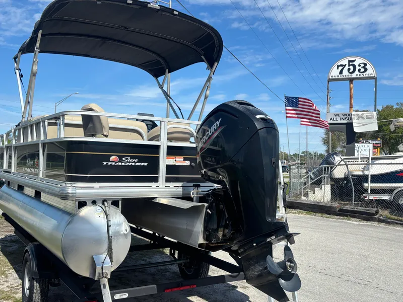 Slide: The Image of 2020 Sun Tracker Bass Buggy 18 DLX pontoon boat with Mercury outboard motor. - 6