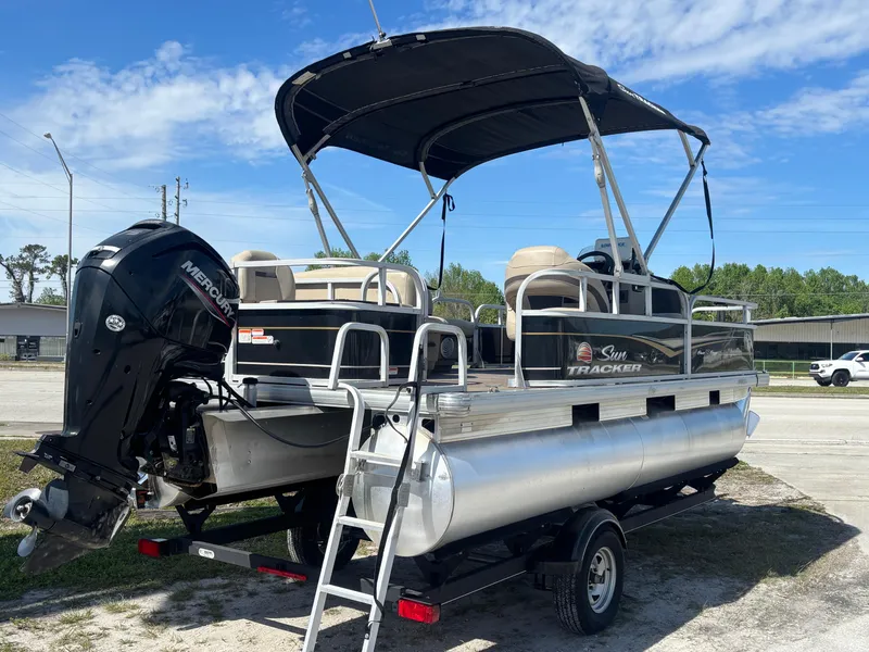 Slide: The Image of 2020 Sun Tracker Bass Buggy 18 DLX pontoon boat with Mercury outboard motor. - 8
