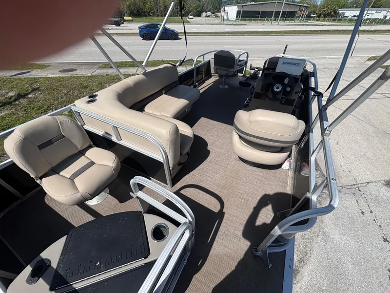 Slide: The Image of 2020 Sun Tracker Bass Buggy 18 DLX pontoon boat with spacious seating and modern design. - 9