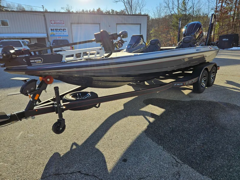 Slide: The Image of 2025 Skeeter ZXR20 boat on trailer in outdoor dealership lot. - 5