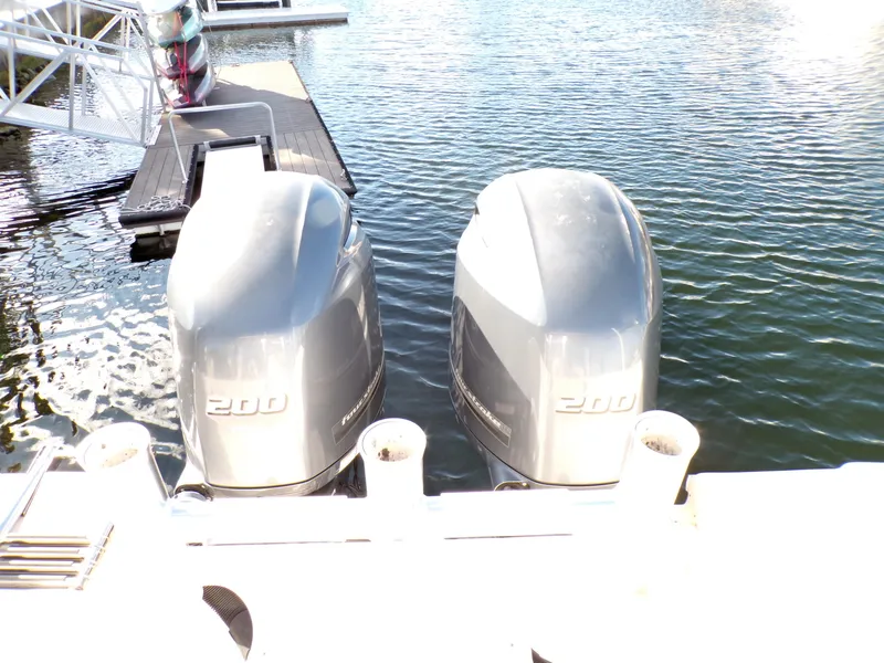 Slide: The Image of Twin 200 horsepower outboard motors on a 2016 Grady-White Freedom 275 boat. - 34