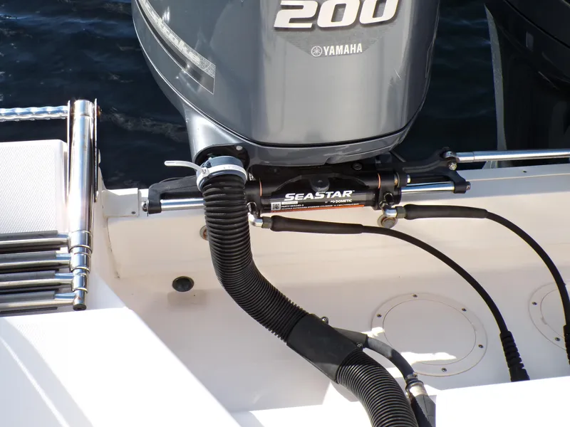 Slide: The Image of 2016 Grady-White Freedom 275 boat with Yamaha 200 engine and SeaStar hydraulic steering. - 45