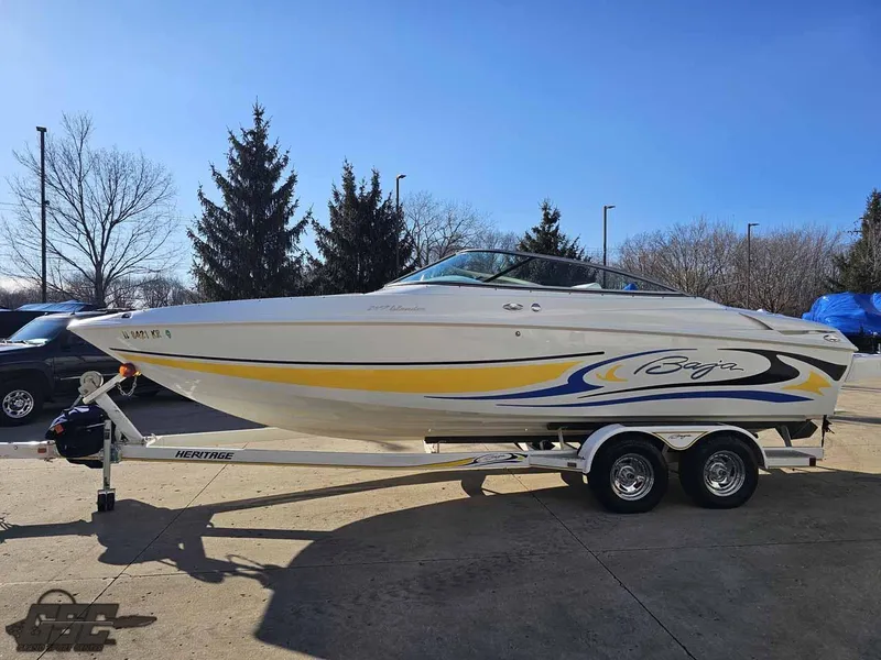 Slide: The Image of 2008 Baja 247 Islander boat on trailer, featuring sleek design and vibrant graphics. - 18