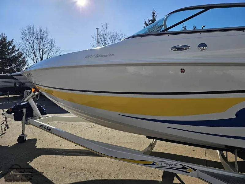 Slide: The Image of 2008 Baja 247 Islander boat on trailer, featuring sleek design and vibrant yellow accents. - 21