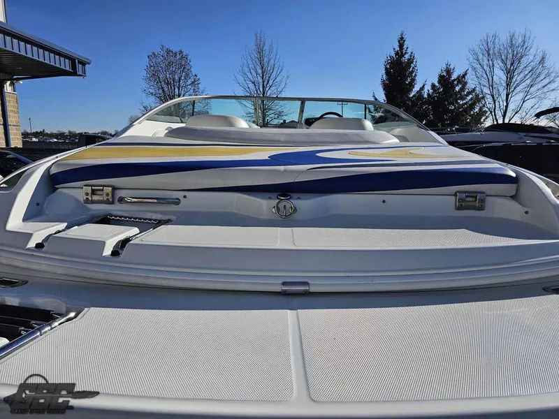 Slide: The Image of 2008 Baja 247 Islander boat, rear view, showcasing sleek design and vibrant colors. - 32