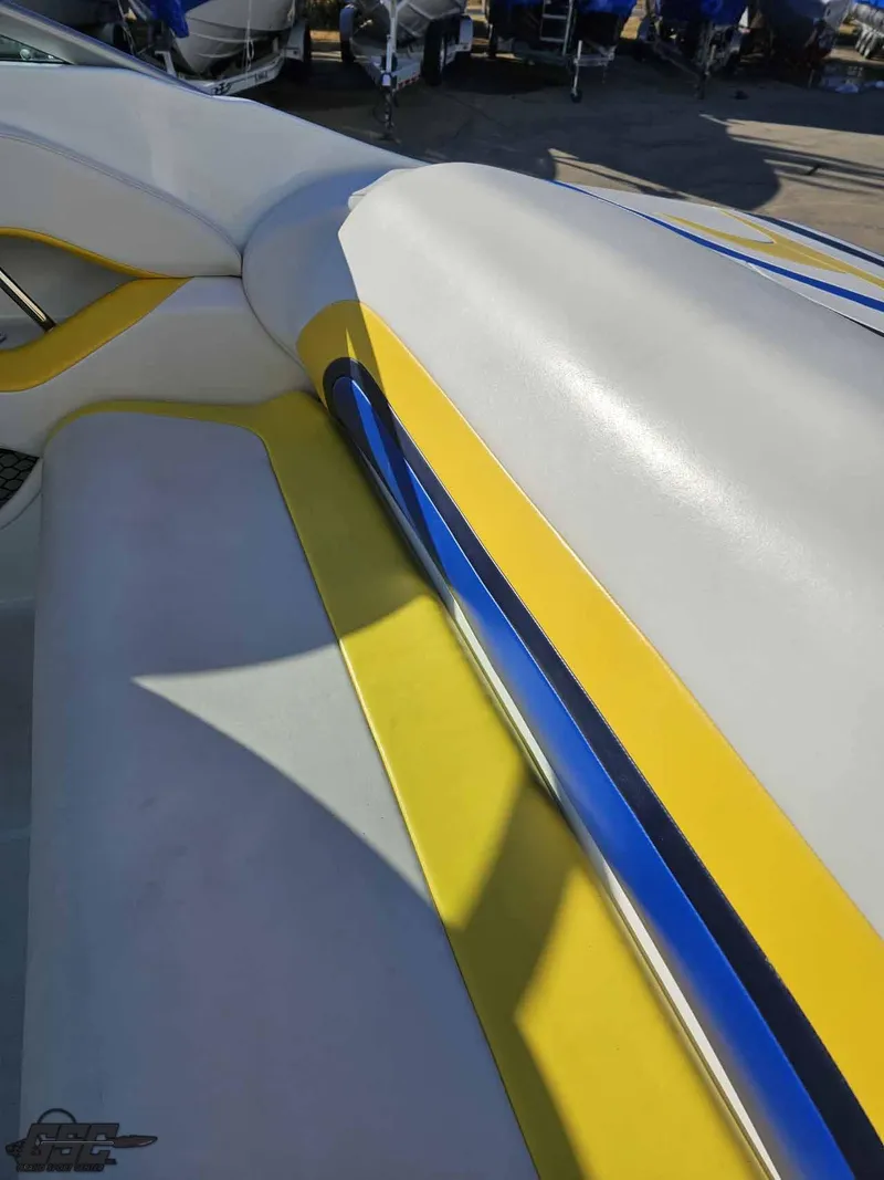 Slide: The Image of 2008 Baja 247 Islander boat interior with yellow and blue accents. - 43