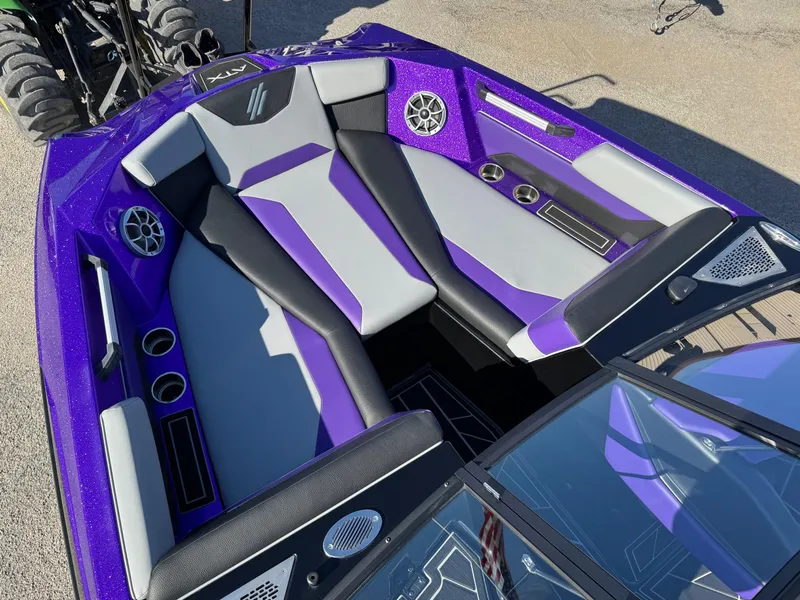 Slide: The Image of 2025 ATX Surf Boats 22 Type-S interior with purple and gray seating, featuring modern design elements. - 12