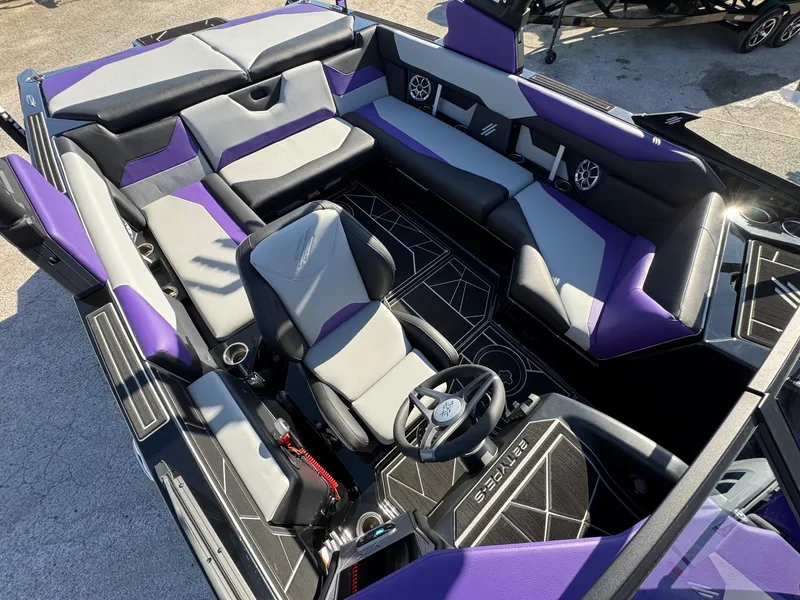 Slide: The Image of 2025 ATX Surf Boats 22 Type-S interior with purple and gray seating, modern design. - 14