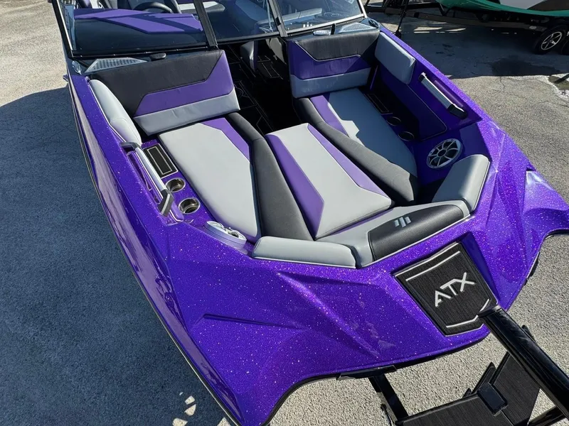 Slide: The Image of 2025 ATX Surf Boats 22 Type-S with purple and gray interior, sleek design. - 16