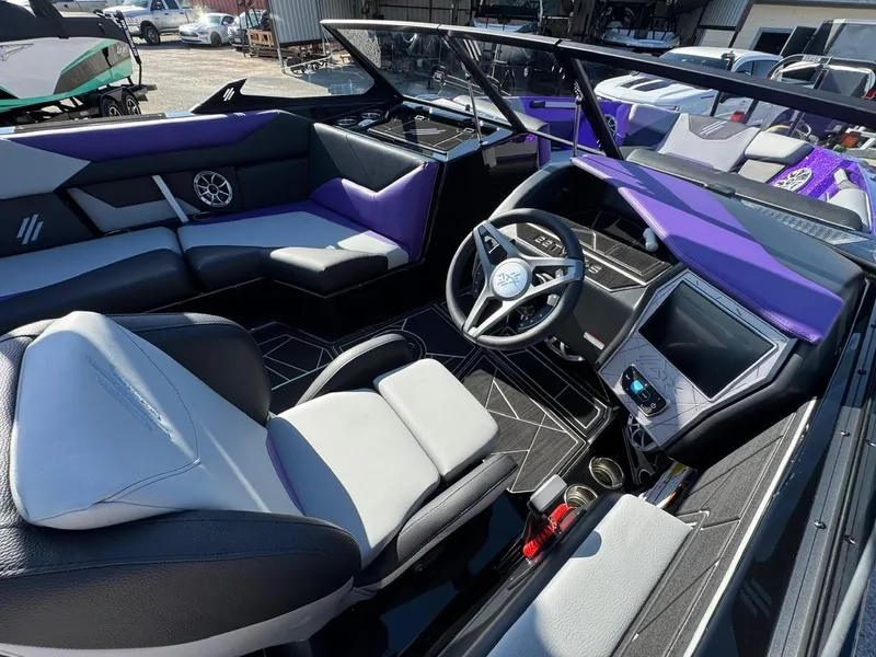 Slide: The Image of 2025 ATX Surf Boats 22 Type-S interior with modern dashboard and seating. - 18