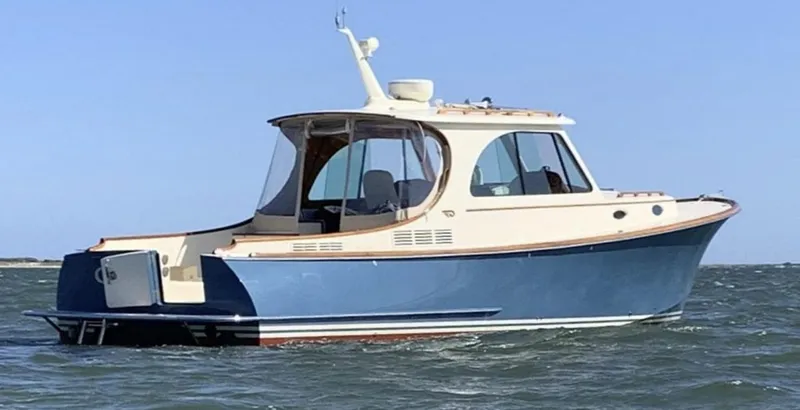The Image of 2018 Hinckley Picnic Boat 37 MKIII cruising on open water. - 0