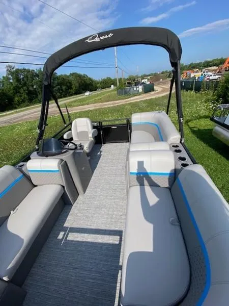 Slide: The Image of 2024 Qwest E814 CTR Cruise L pontoon boat with spacious seating and canopy. - 4